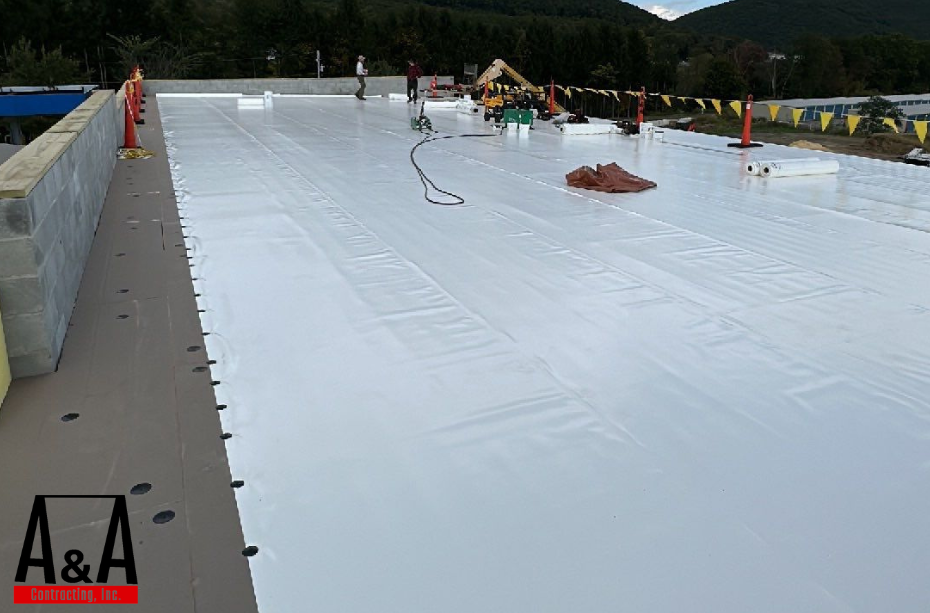 Commercial roof project featuring flat roof repair completed by A&A Contracting.